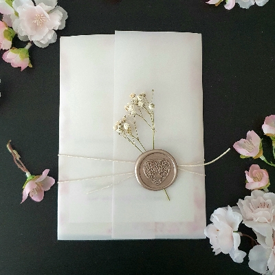 Cherished Cards has introduced dried flowers into their wedding stationery