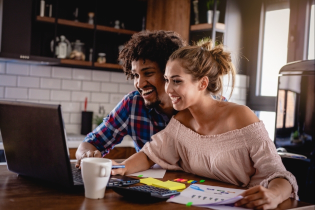 Couple sat at a computer