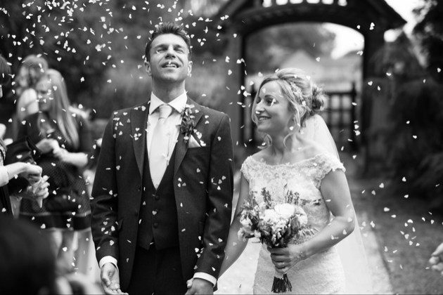 Couple walking in confetti