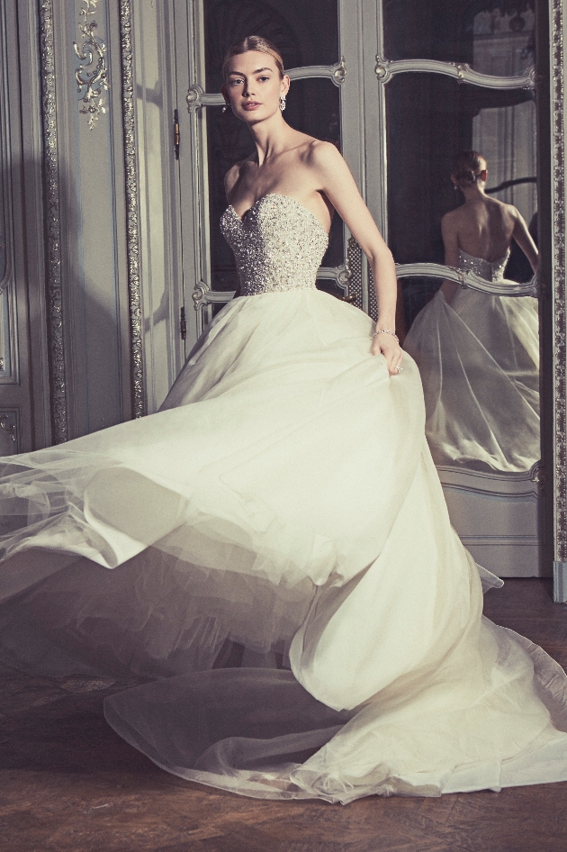 model wearing princess gown with sequinned bodice 