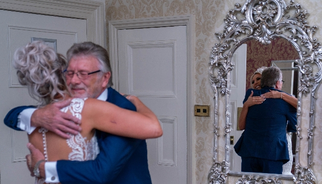 Brides and her father on the morning of the wedding