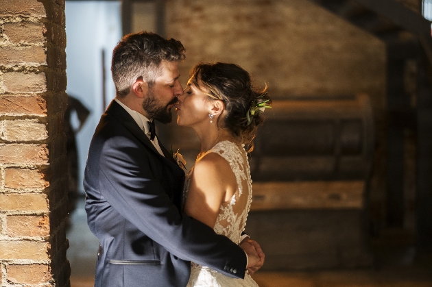 Bride and groom kissing