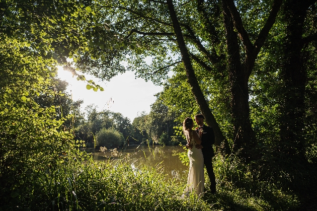 Couple by the lake at Lythe Hill Hotel & Spa