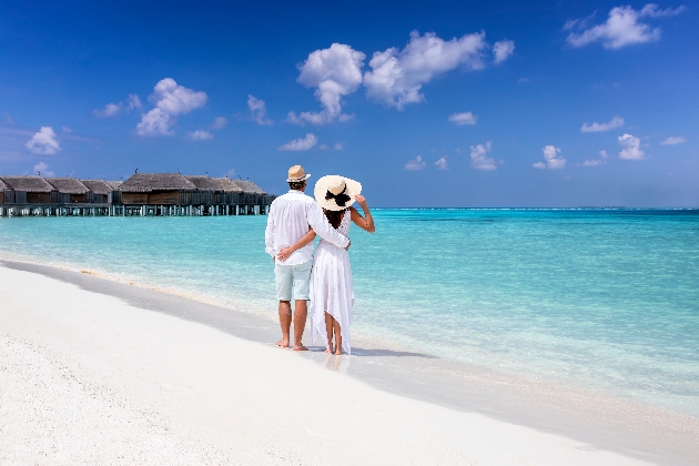 Couple walking on the beach