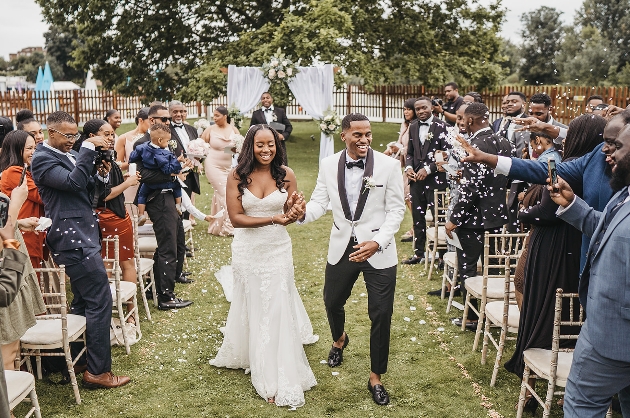 Couple walking down the aisle