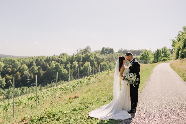 Couple embracing in the grounds of Denbies Wine Estate