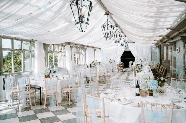 Indoor wedding breakfast set up