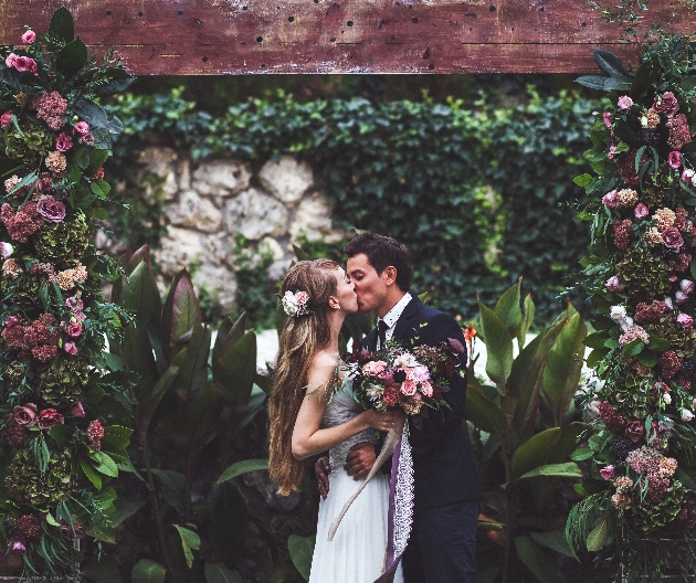 Bride and groom kissing