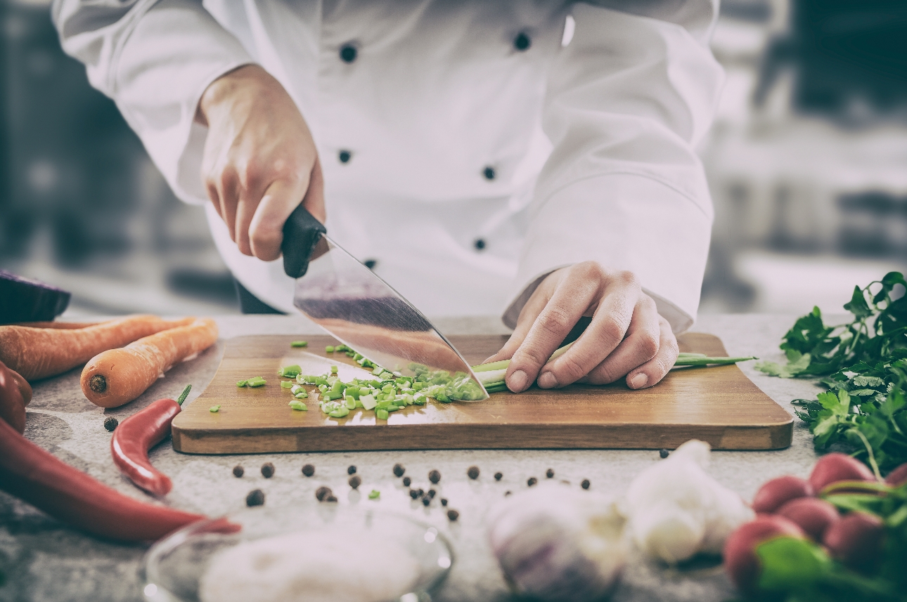 chef prepping food in a kitchen