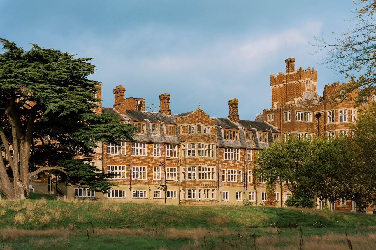 historic building surrounded by garden landscape