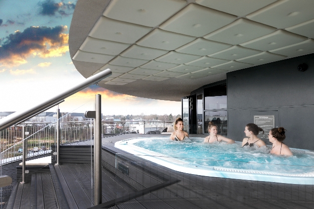 roof hot tub three women in it