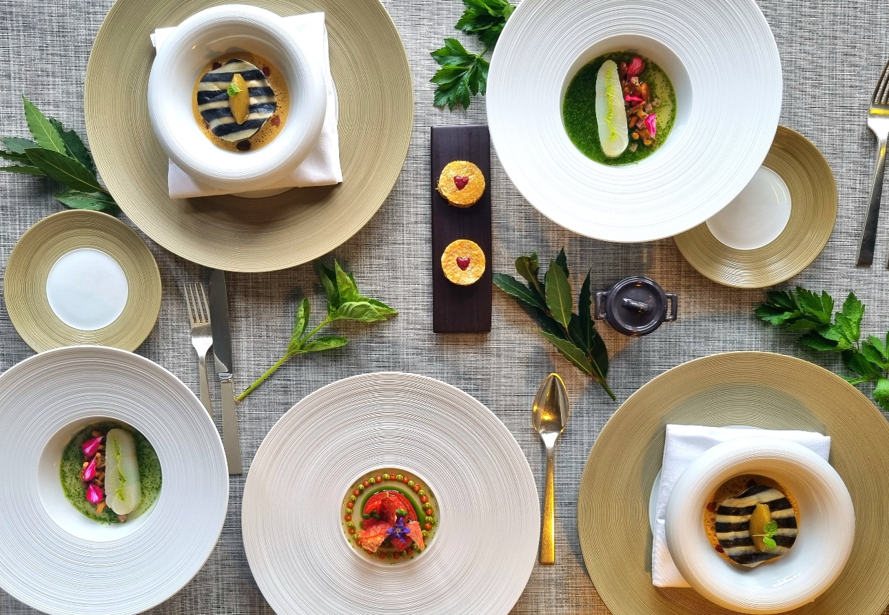 aerial view of six plates of food