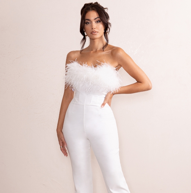 I'm a Barbie Girl-inspired jumpsuit with feather trim by Club L London