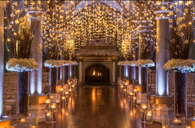 grand ceremony room, marble pillars, fireplace, fairylights