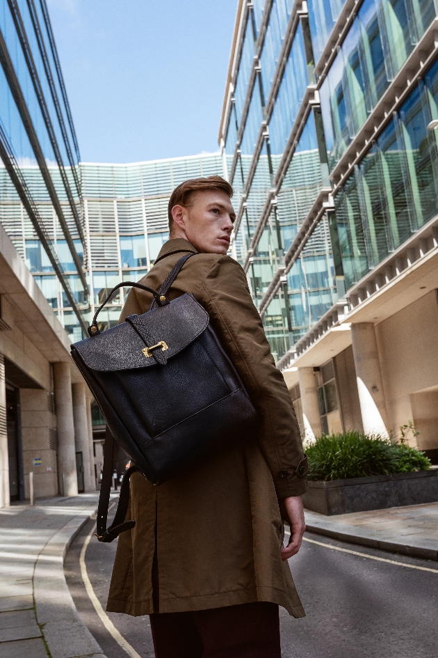 Man walking with a bag on his back