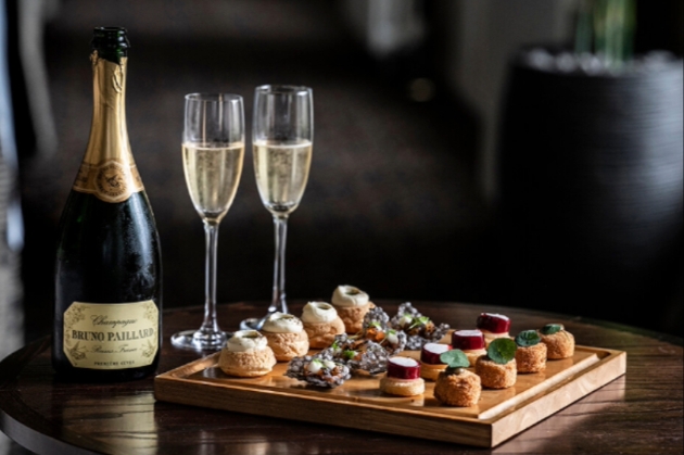 champagne and nibbles. new year celebration treats