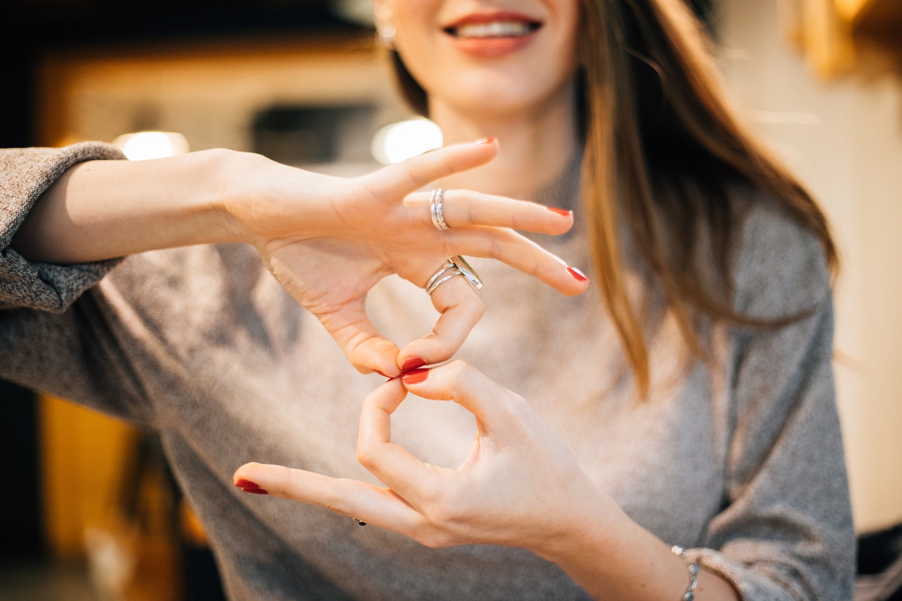 woman doing sign language 