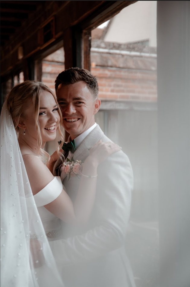 wedding couple on their wedding day with faded corner on image