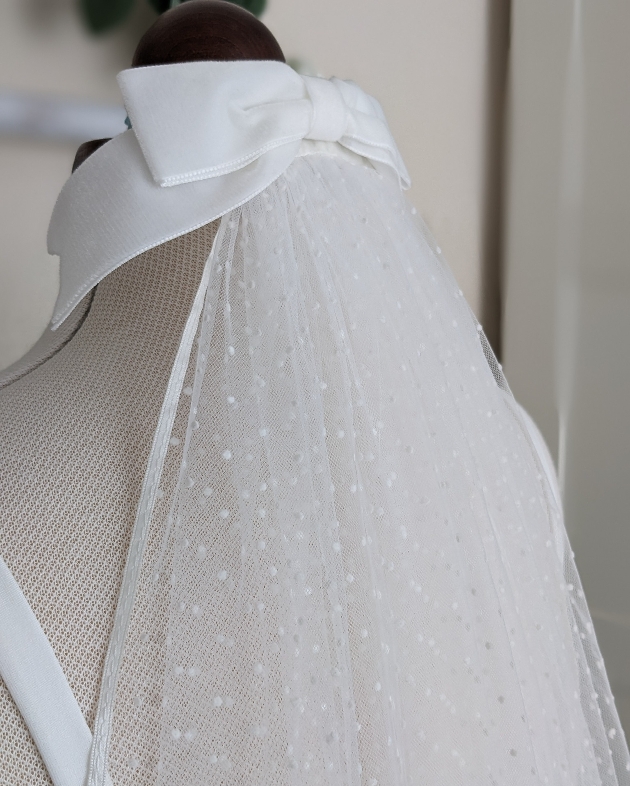 white polka dot veil with bow top