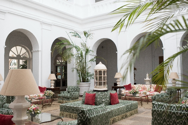 A foyer with colourful sofas