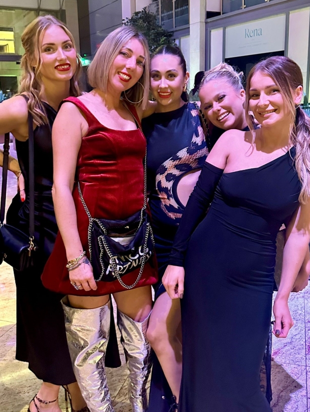 group of women dressed up for a night out 