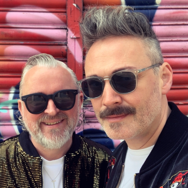 selfie of two gentlemen wearing sunglasses