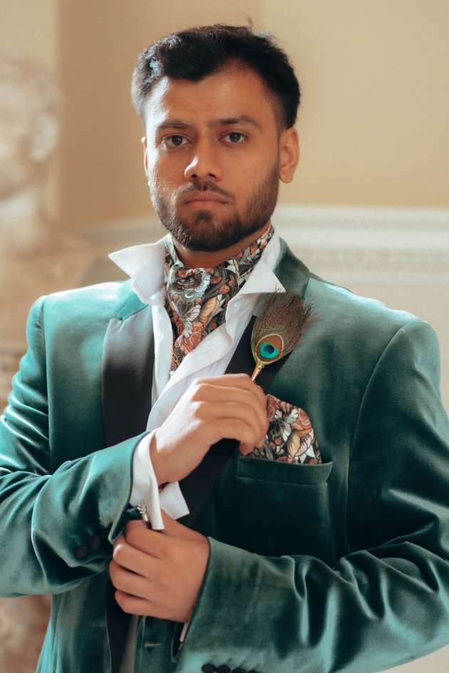 man wearing green suit