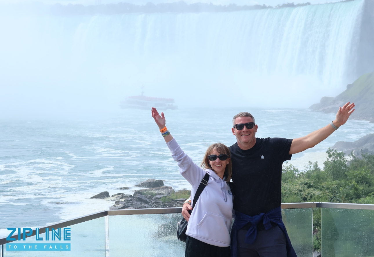 Richard and wife in front of falls