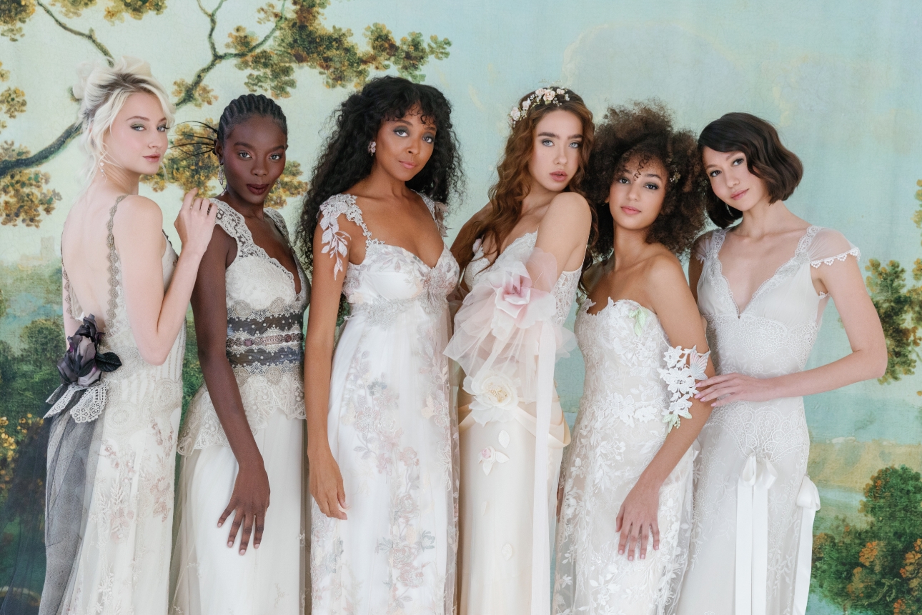 six models in different dresses all with lots of detail 