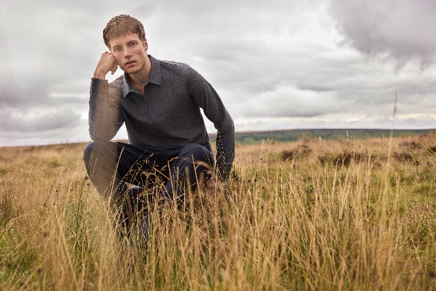 A man sitting in a field